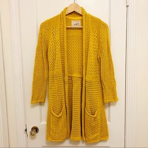 Golden yellow sweater from Anthropologie